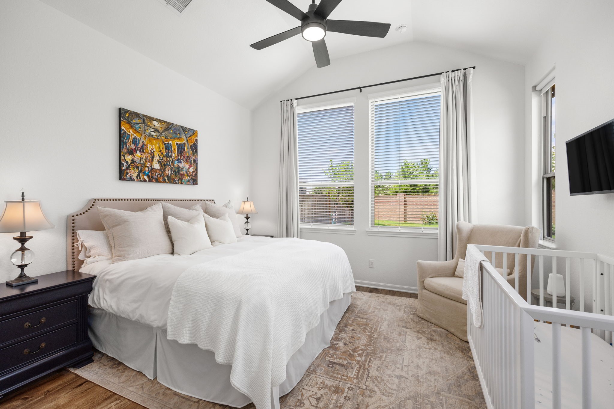 16239 Rattlesnake Run Trail Cypress, TX 77433 - Photo 19 of 37 Primary suite located downstairs includes vaulted ceilings and black out drapes and shades