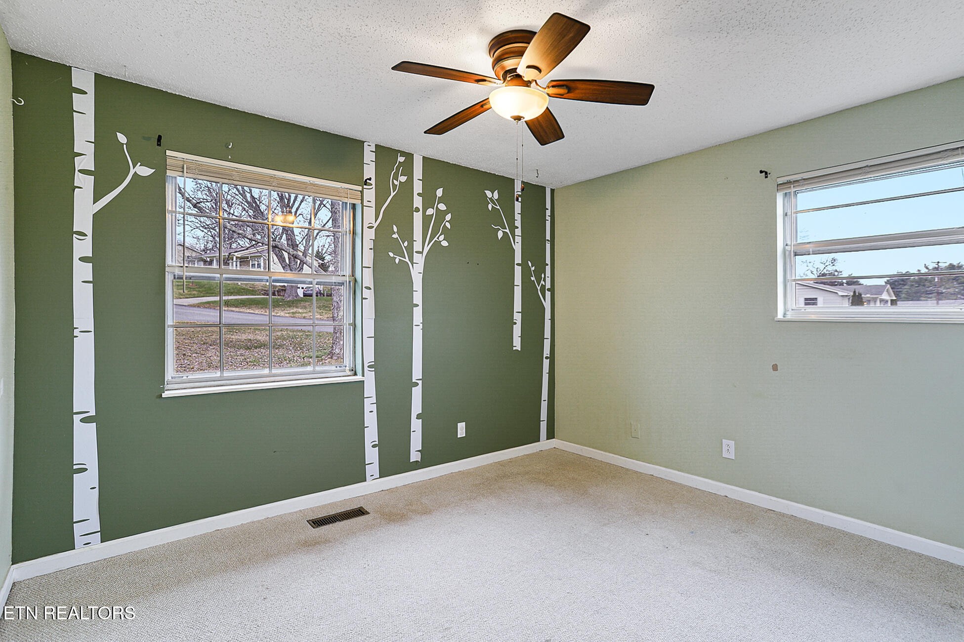 7701 Maida Vale Circle Powell, TN 37849 - Photo 18 of 36 a view of room with window and ceiling fan
