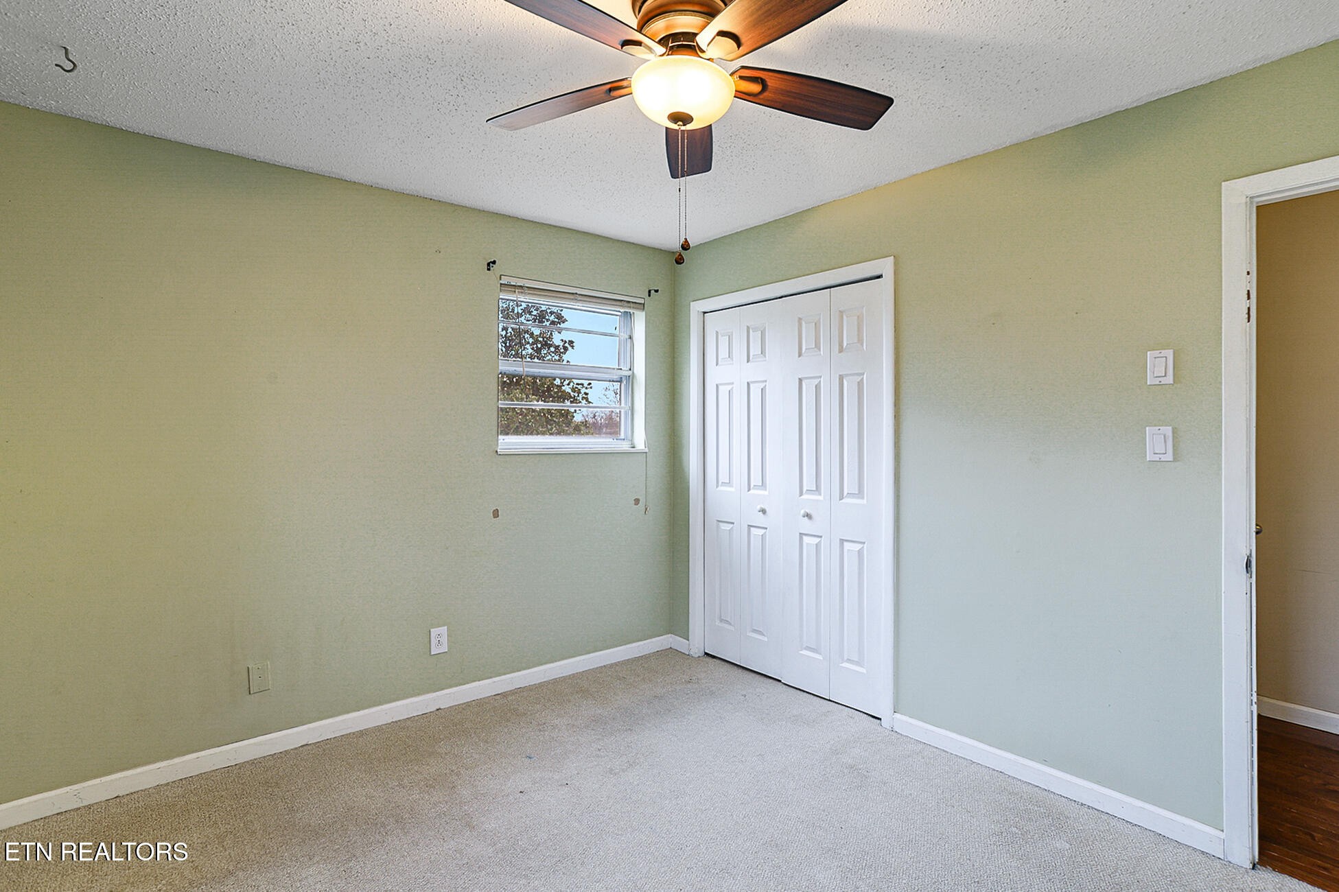7701 Maida Vale Circle Powell, TN 37849 - Photo 19 of 36 en view of a livingroom with a chandelier fan