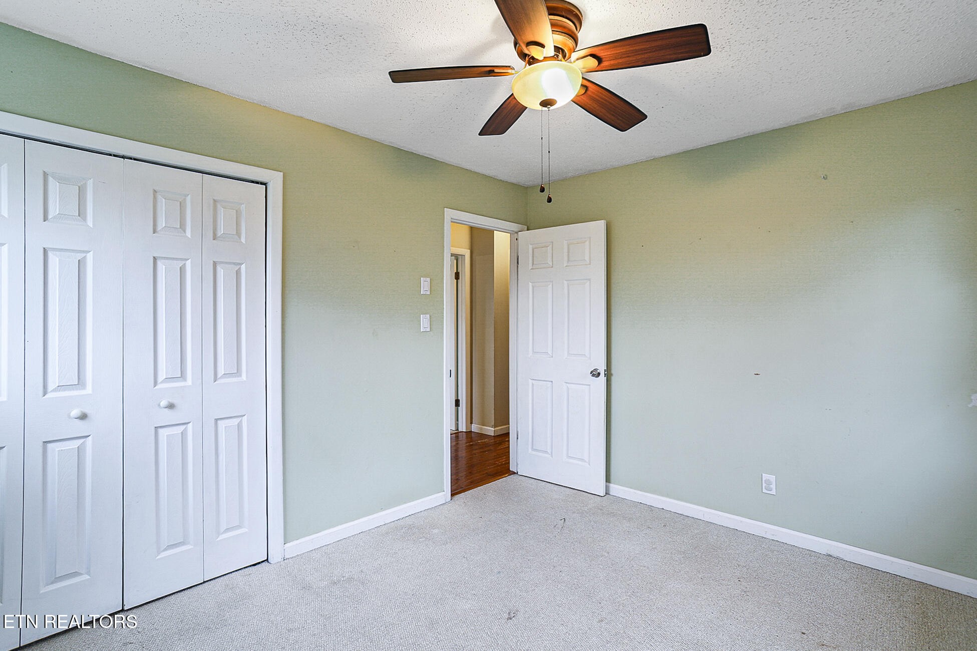 7701 Maida Vale Circle Powell, TN 37849 - Photo 20 of 36 an empty room and chandelier fan