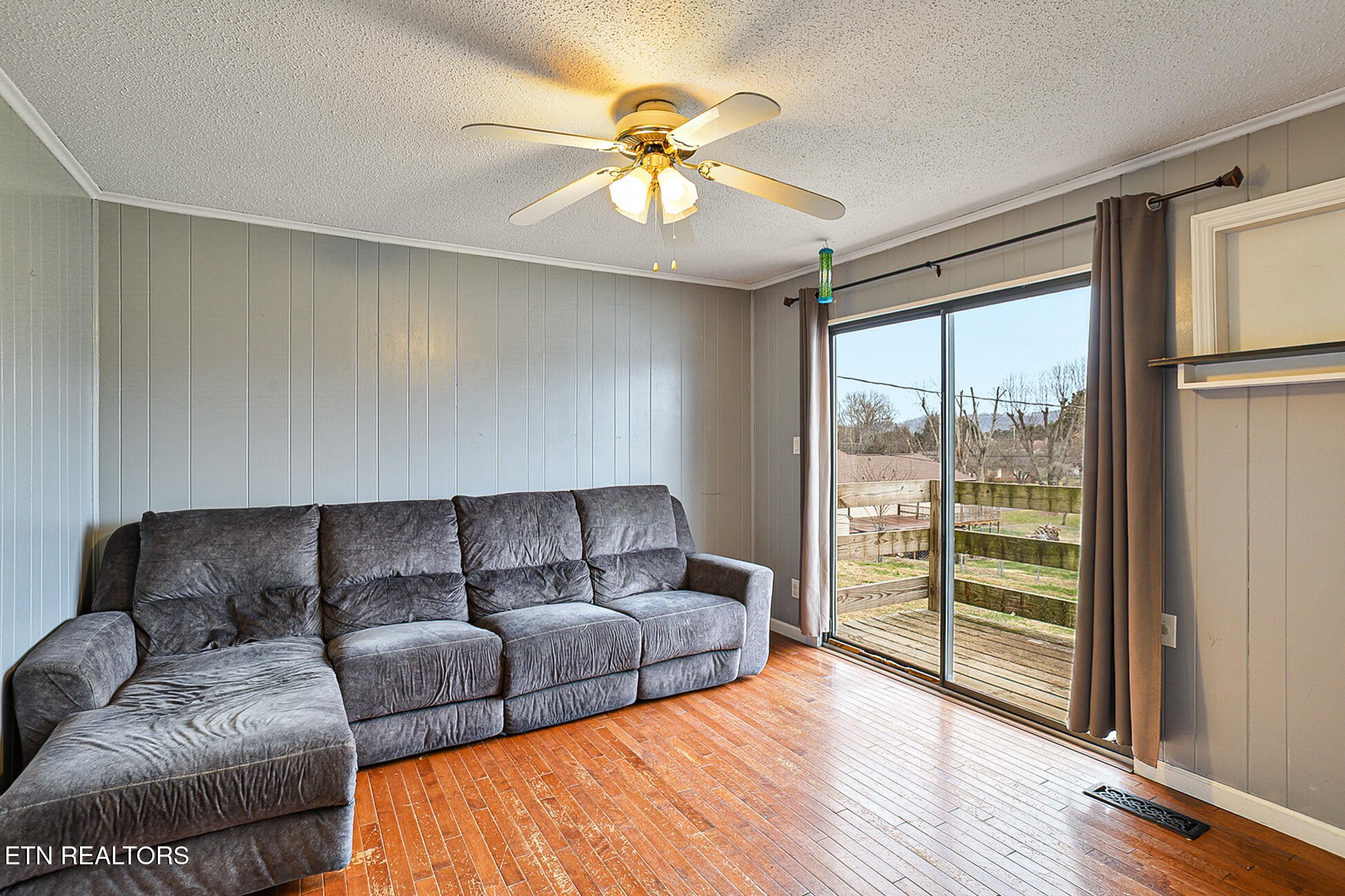 7701 Maida Vale Circle Powell, TN 37849 - Photo 26 of 36 a living room with furniture and a large window