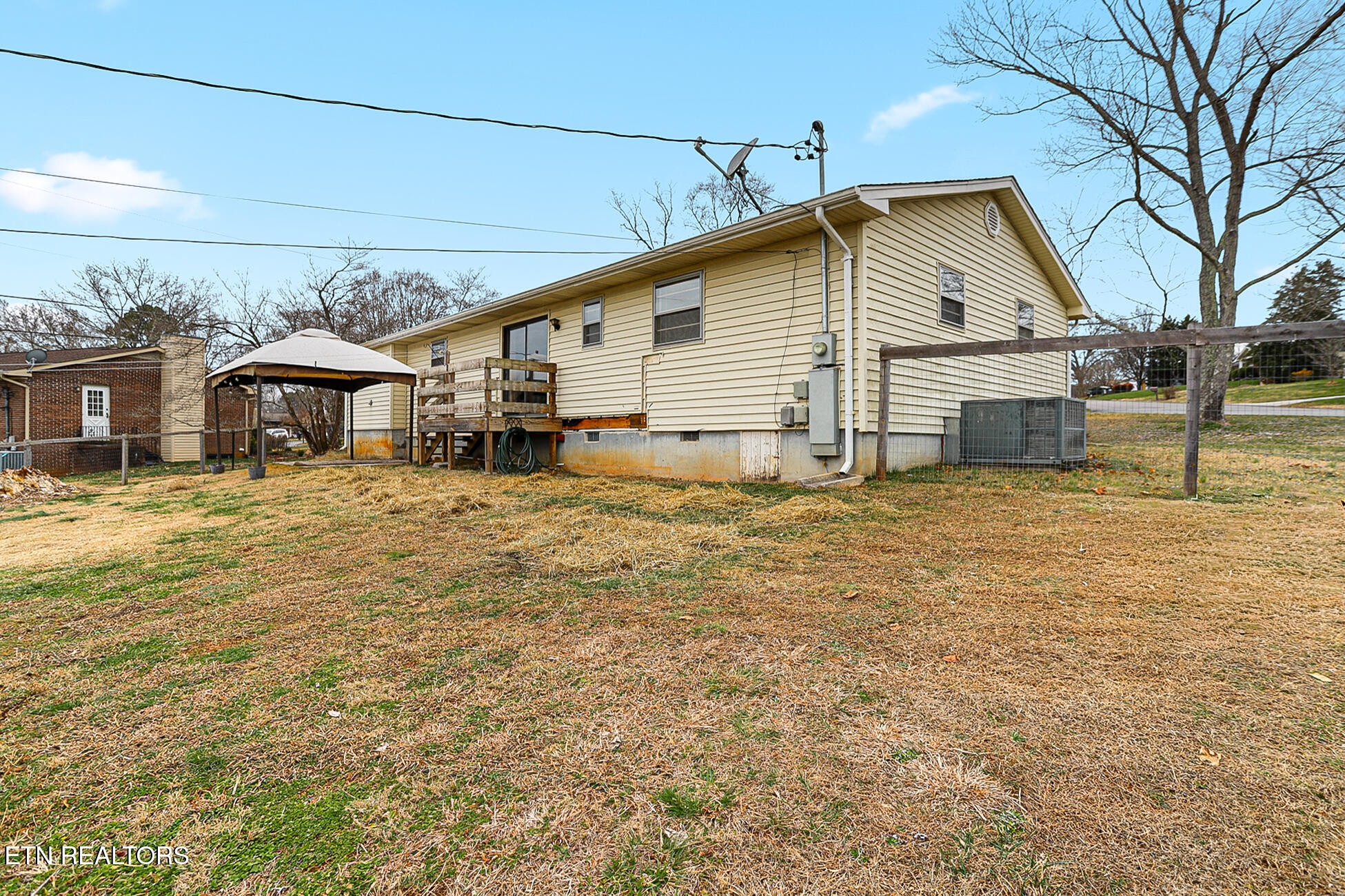 7701 Maida Vale Circle Powell, TN 37849 - Photo 32 of 36 a view of a house with a big yard and large trees