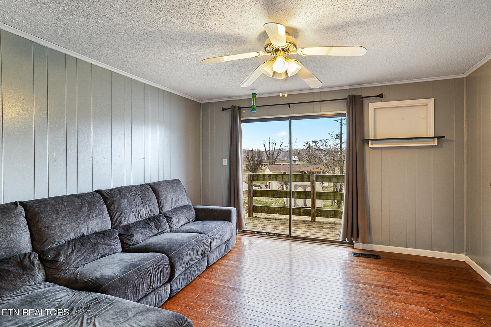 7701 Maida Vale Circle Powell, TN 37849 - Photo 6 of 36 a living room with furniture and a large window