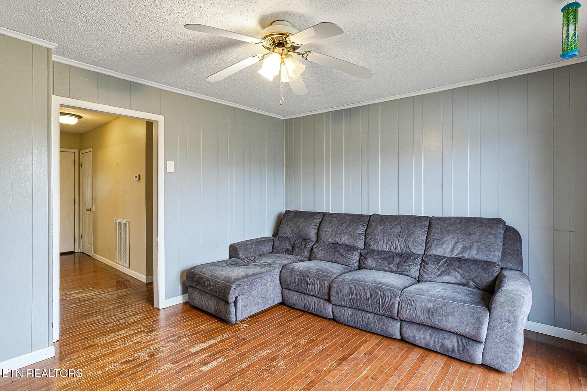 7701 Maida Vale Circle Powell, TN 37849 - Photo 7 of 36 a living room with furniture and a couch