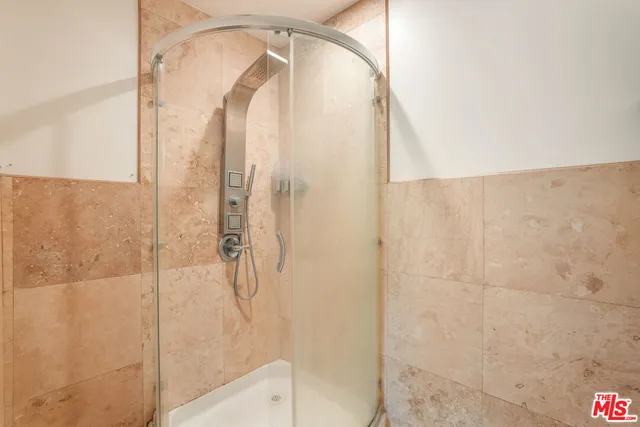 a view of a chairs and table in patio