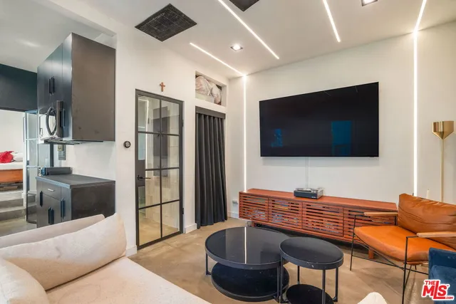 a kitchen with stainless steel appliances granite countertop a stove and a refrigerator
