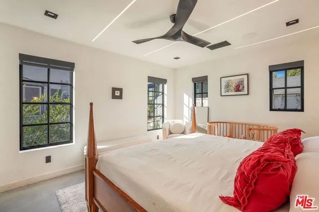 a bathroom with a sink and a large mirror