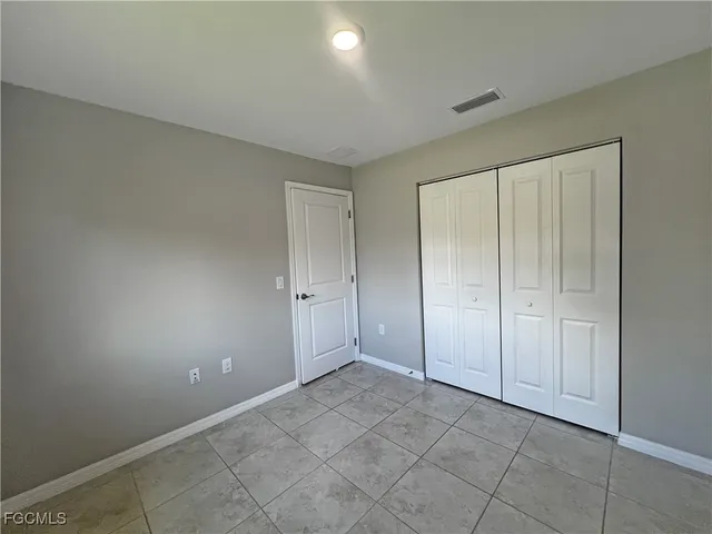 an empty room with a natural light