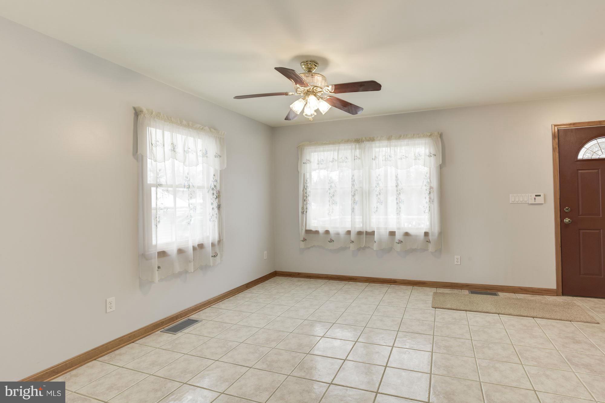 1426 Galena Road Baltimore, MD 21221 - Photo 11 of 30 Breakfast room with tiled floor. Leads to deck.