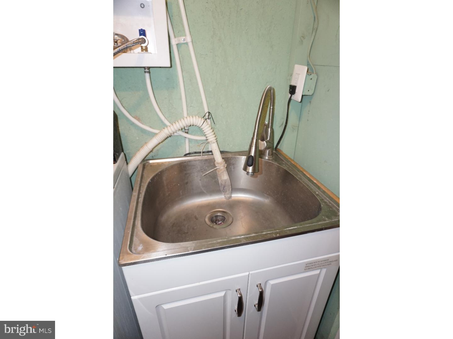 9940 Wingtip Road Philadelphia, PA 19115 - Photo 11 of 14 Laundry Room