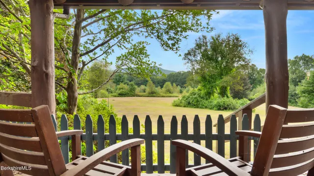 a view of a wooden fence