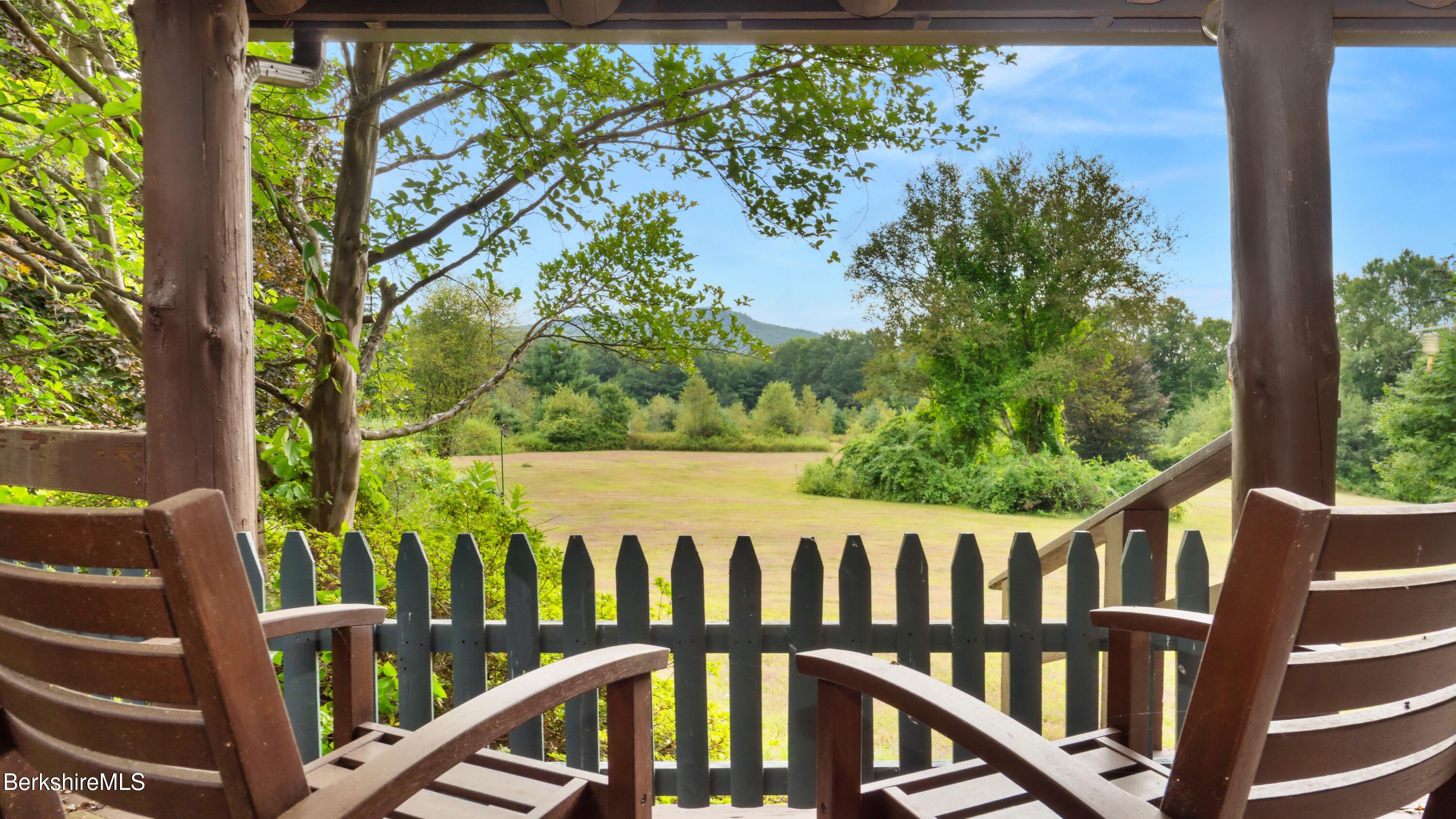 a view of a wooden fence