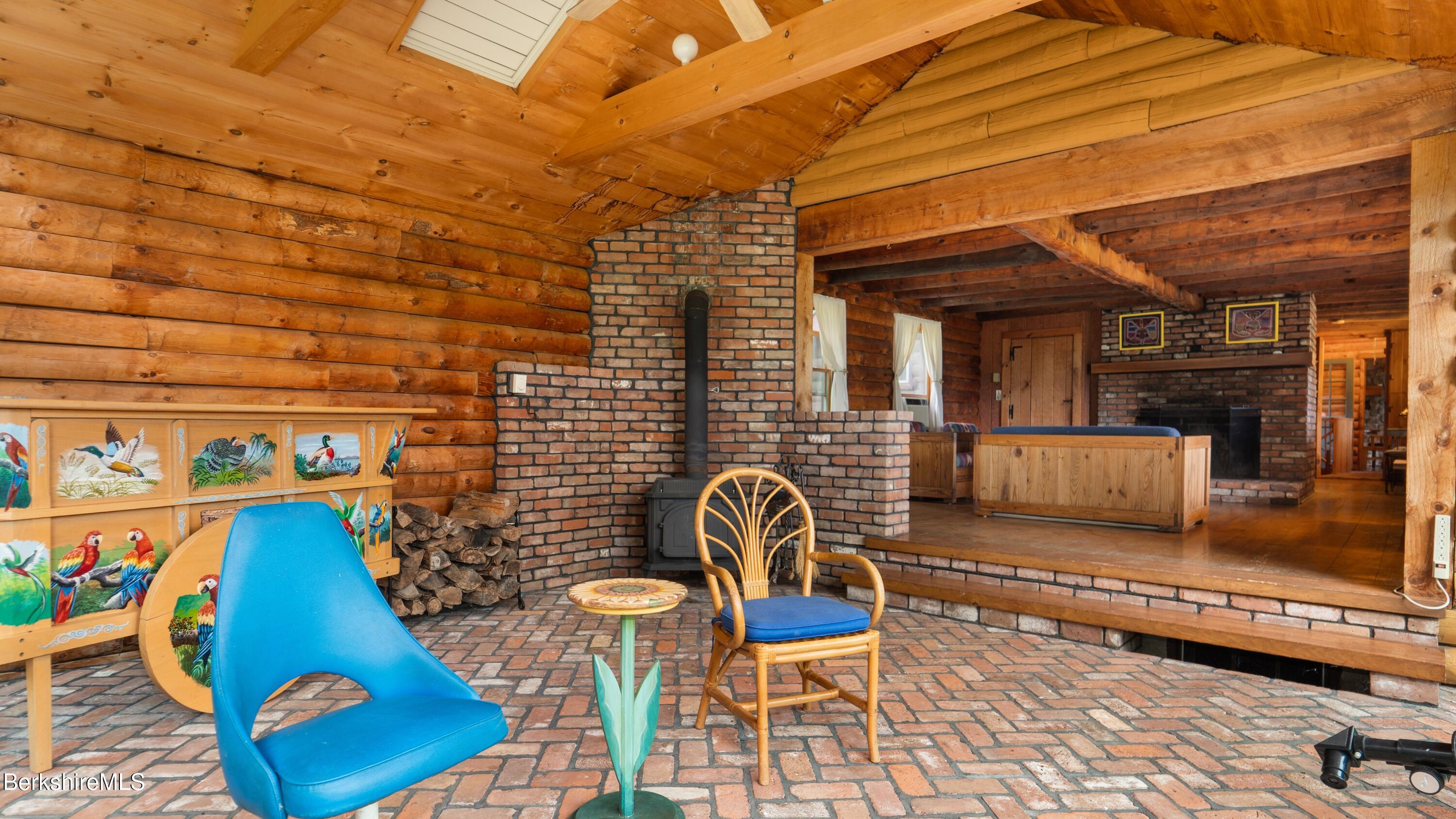 76 Corashire Road New Marlborough, MA 01230 - Photo 11 of 31 a view of a chairs and table in the terrace