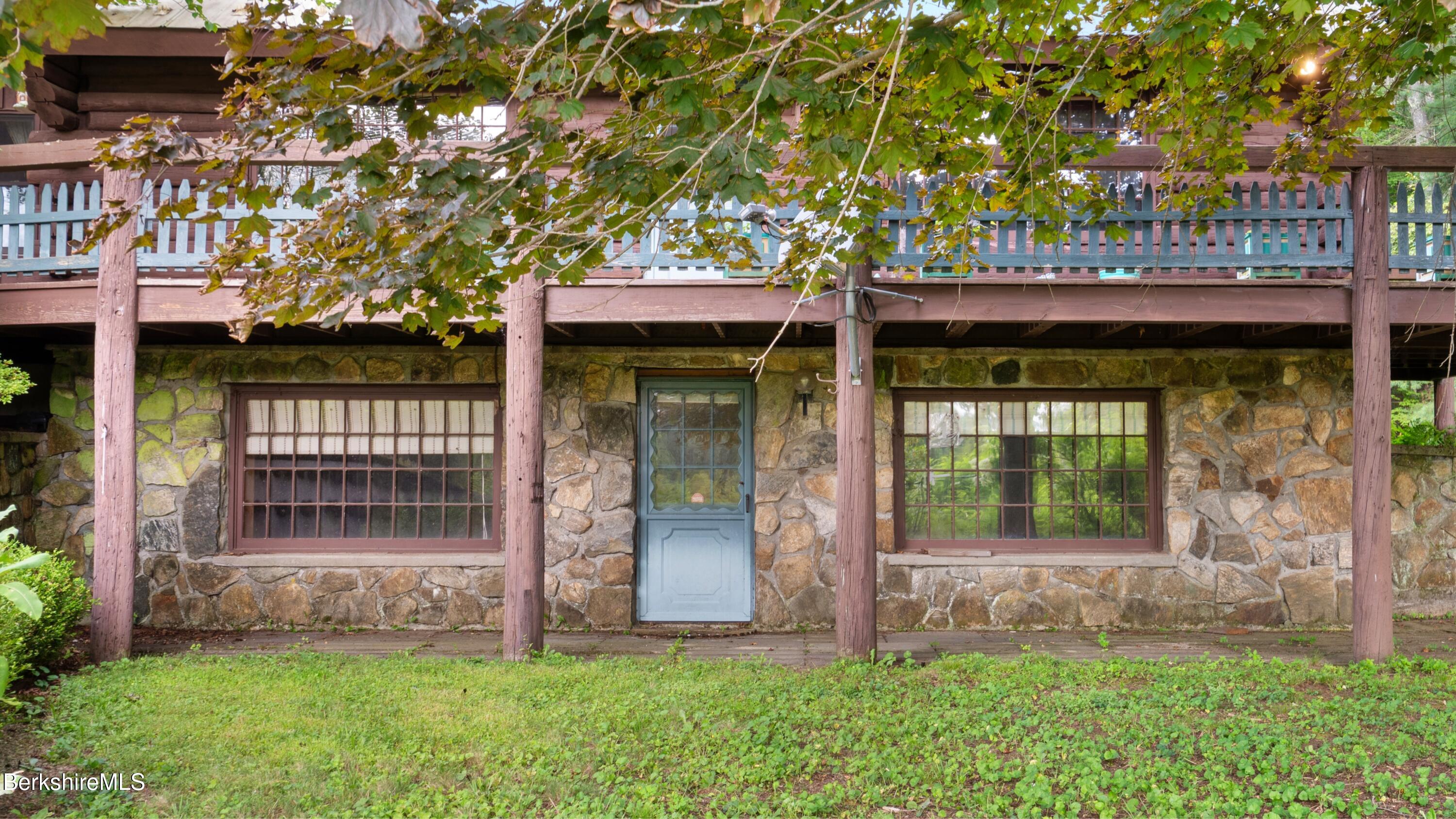 76 Corashire Road New Marlborough, MA 01230 - Photo 28 of 31 a front view of a house with a garden