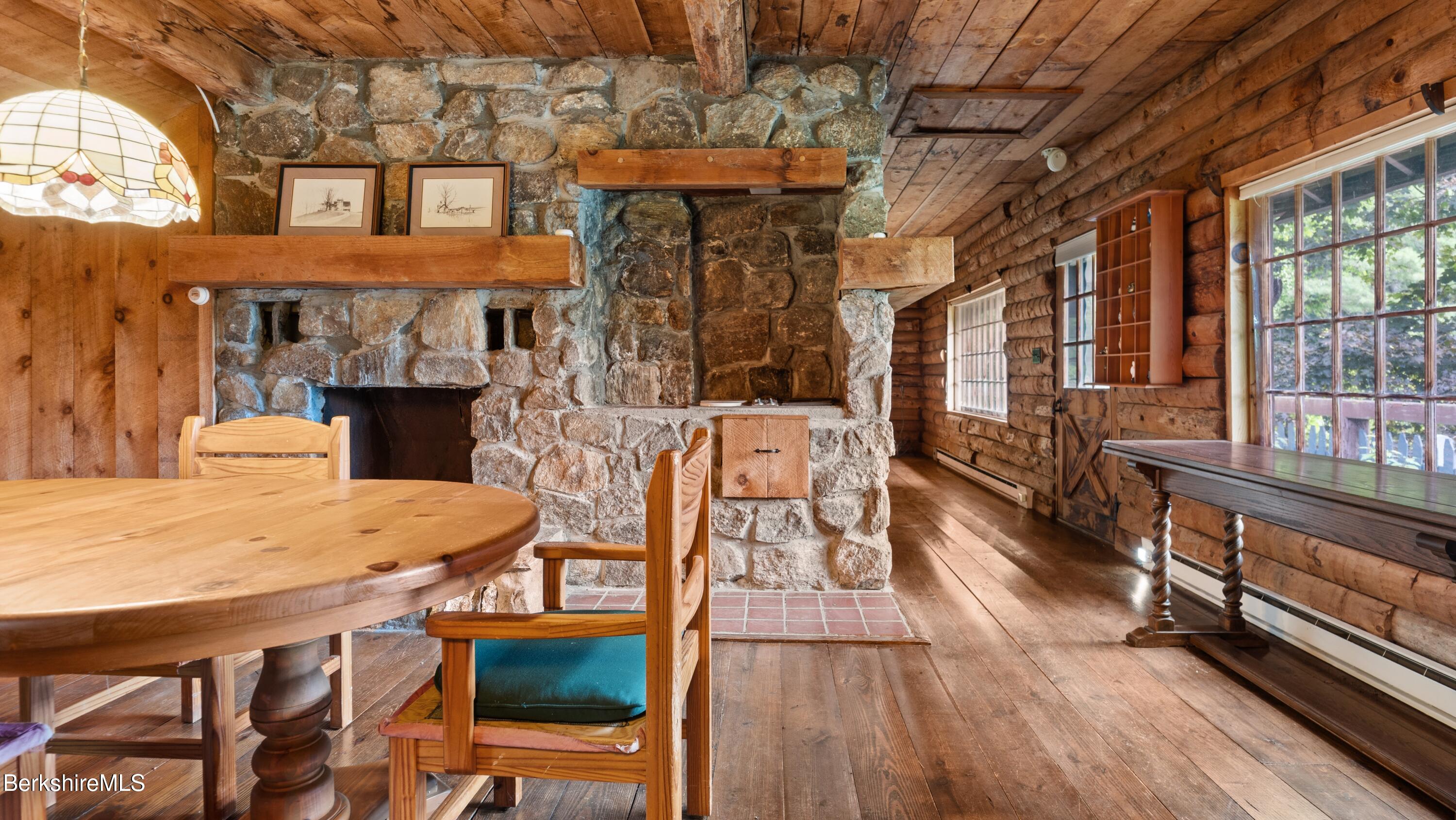 76 Corashire Road New Marlborough, MA 01230 - Photo 9 of 31 a view of a dining room with furniture and wooden floor