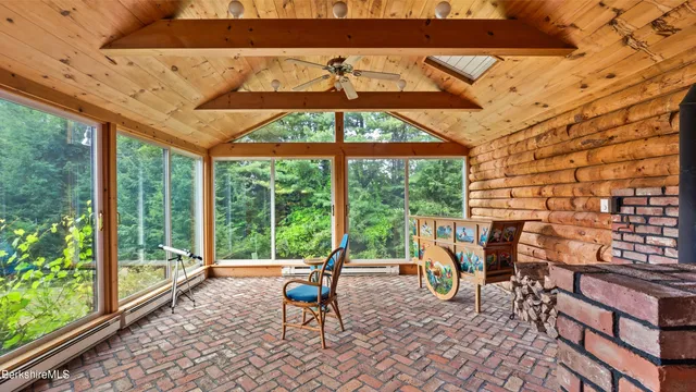 a view of a chairs and table in the terrace