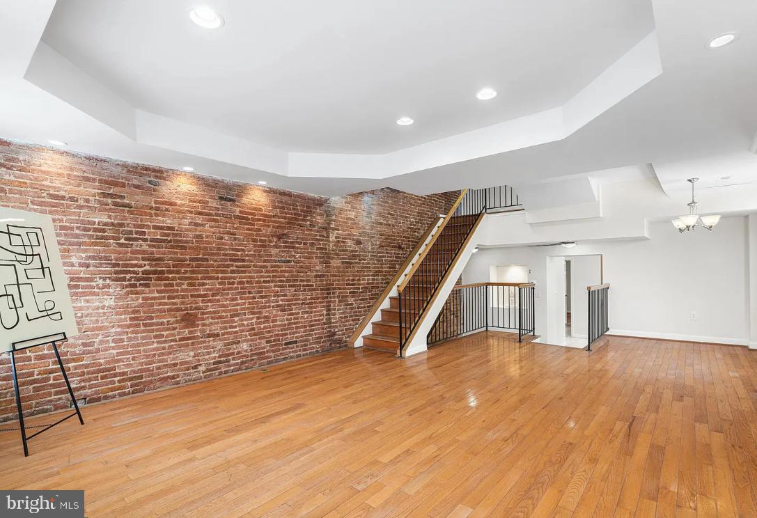 1401 Druid Hill Avenue, Unit B Baltimore, MD 21217 - Photo 4 of 23 a view of empty room with wooden floor