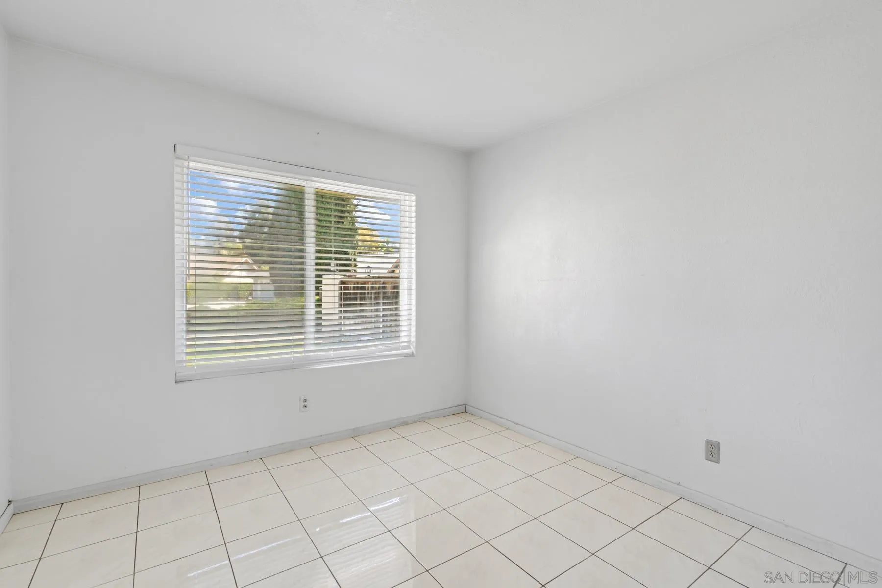 13246 Powers Court Poway, CA 92064 - Photo 18 of 39 a view of an empty room with a window