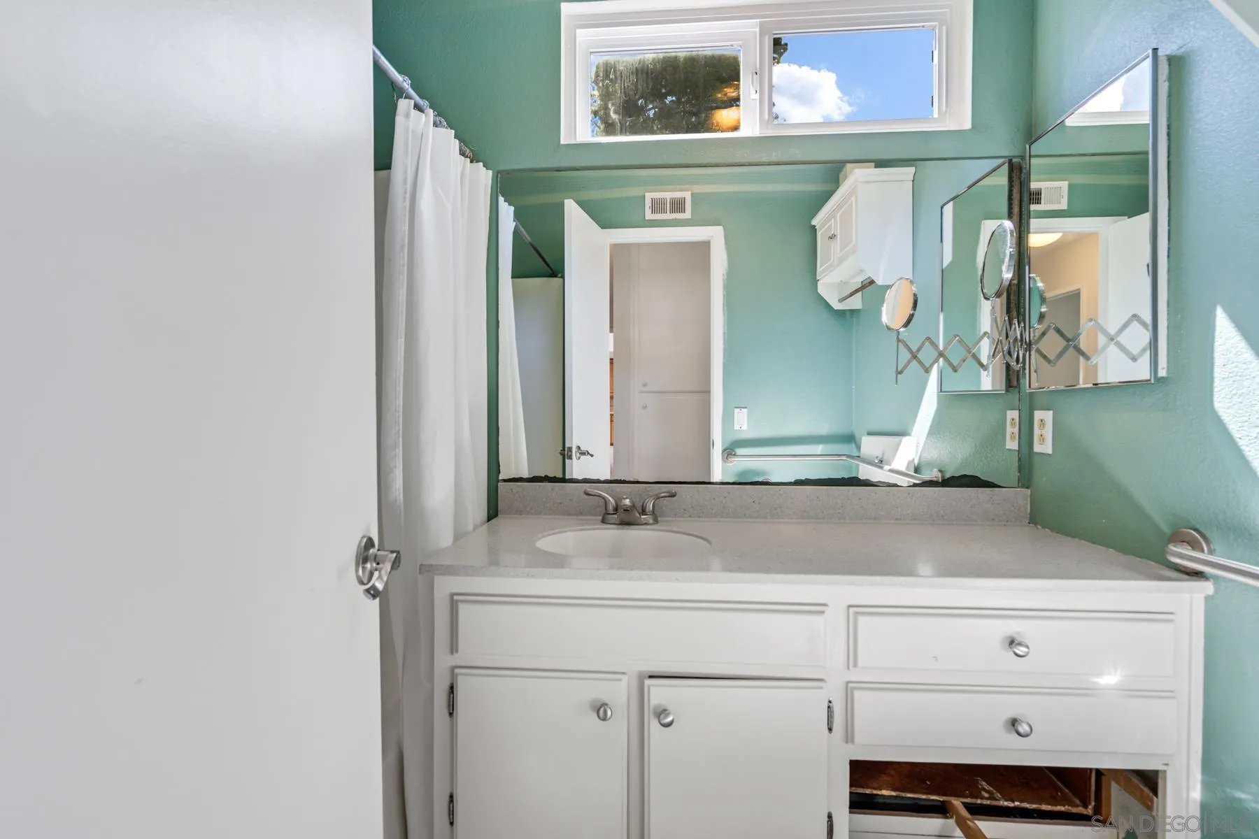 13246 Powers Court Poway, CA 92064 - Photo 21 of 39 a sink with a mirror