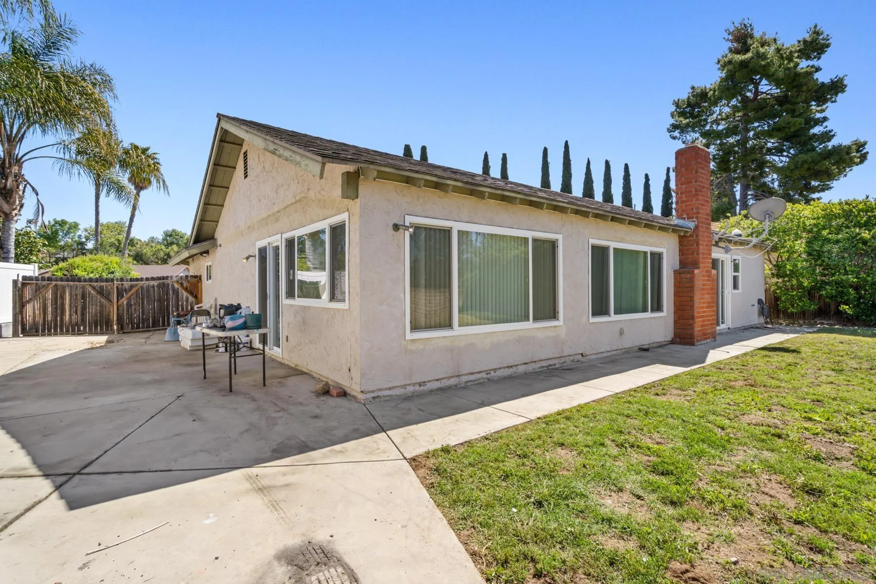 13246 Powers Court Poway, CA 92064 - Photo 29 of 39 a view of a house with backyard and sitting area