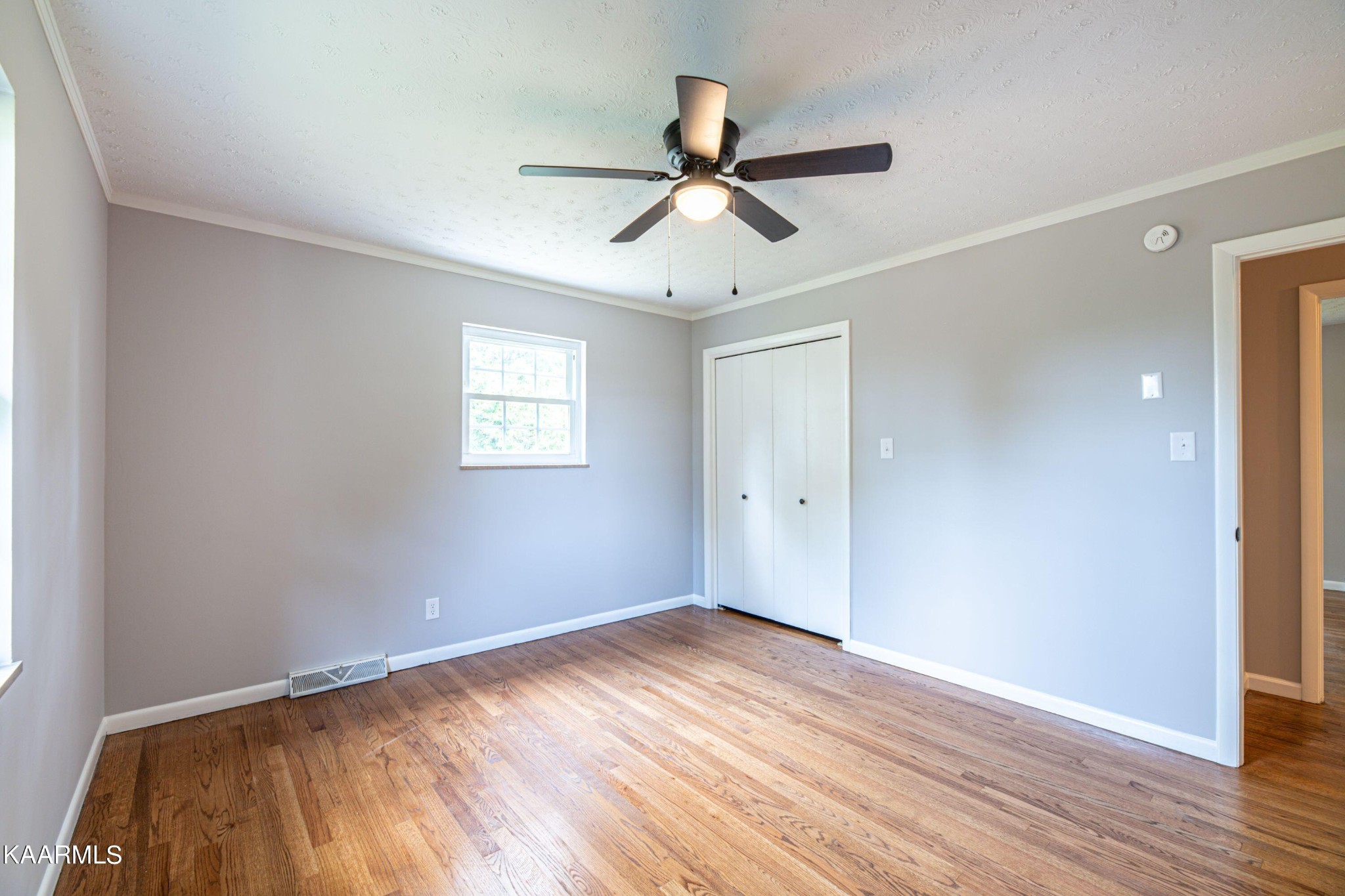 600 Schenley Road Knoxville, TN 37923 - Photo 21 of 38 a view of empty room with wooden floor and fan