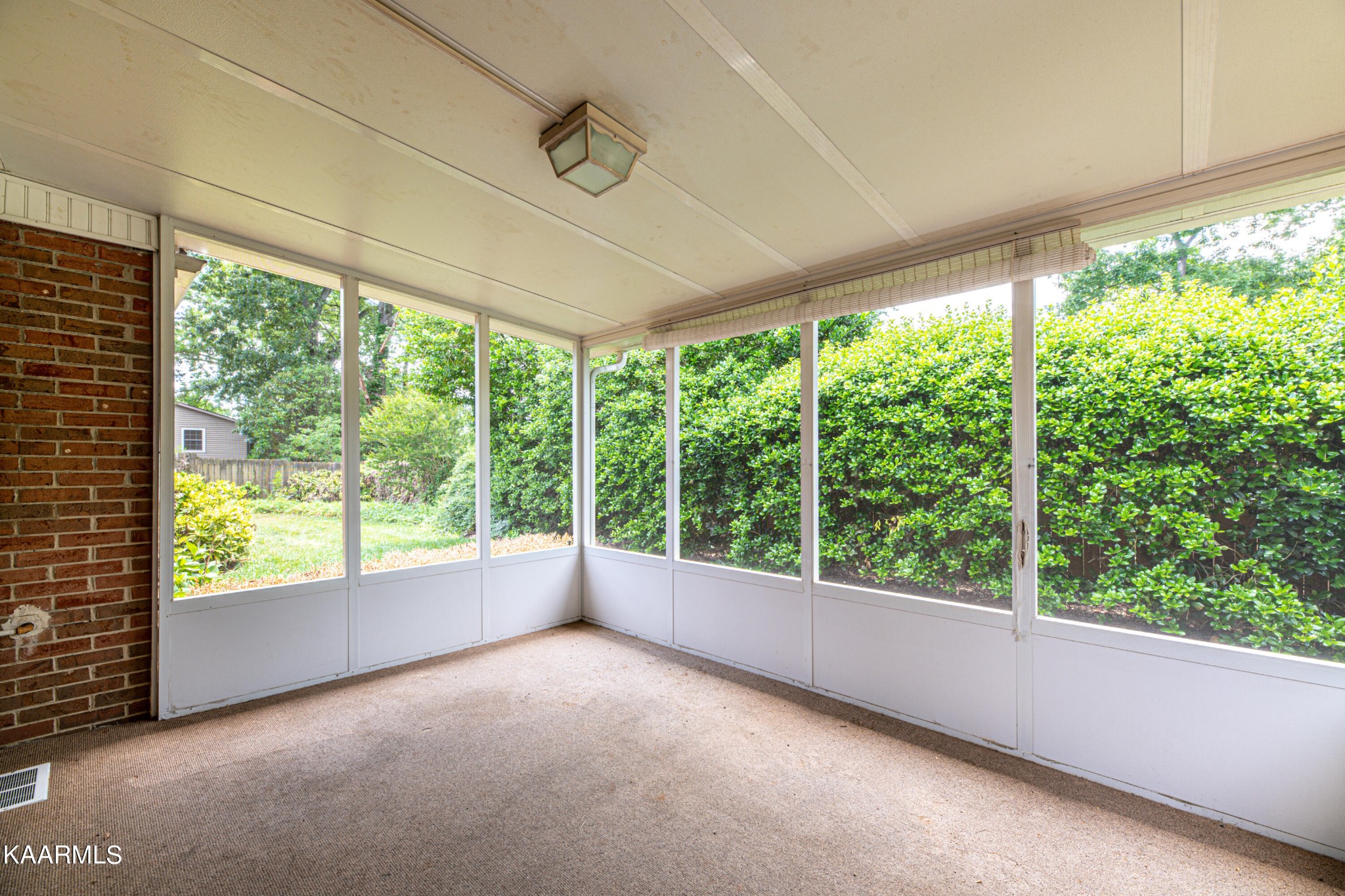 600 Schenley Road Knoxville, TN 37923 - Photo 28 of 38 a view of room with green walls and floor to ceiling window
