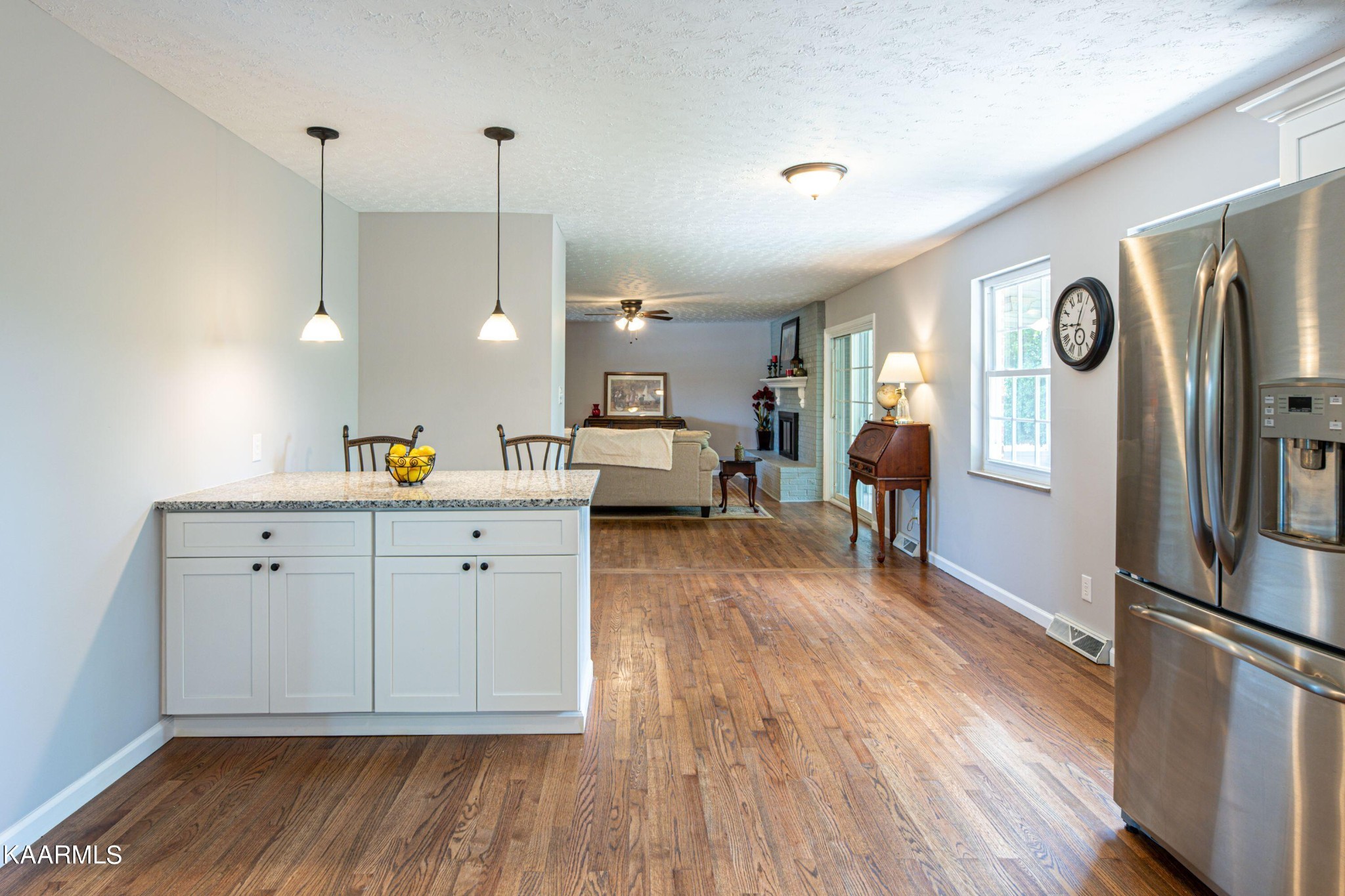 600 Schenley Road Knoxville, TN 37923 - Photo 7 of 38 a view of a kitchen with furniture and wooden floor