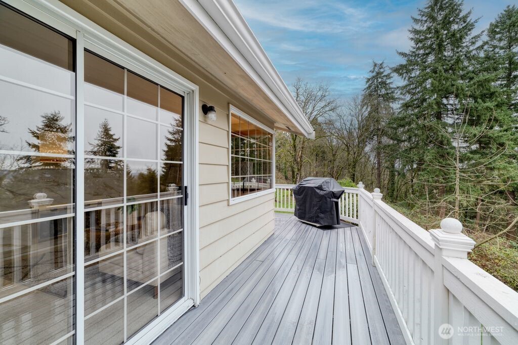 718 East Walnut Street Kent, WA 98030 - Photo 22 of 29 a view of balcony with a large window and wooden floor