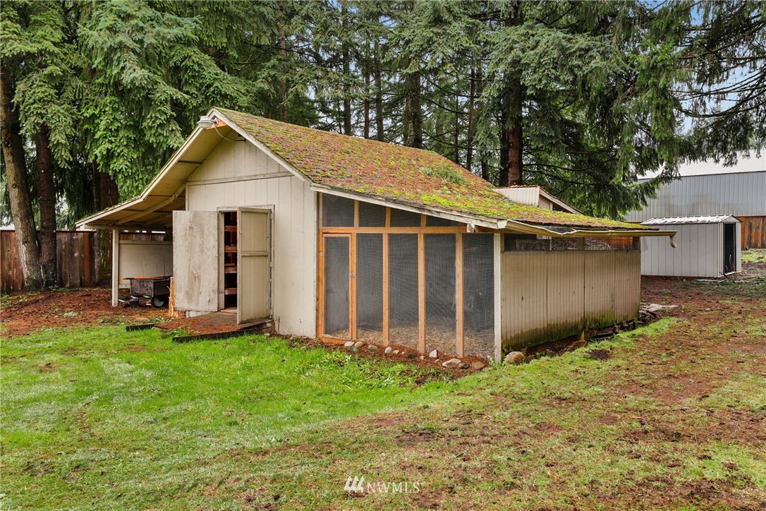 18625 Nutmeg Street Southwest Rochester, WA 98579 - Photo 15 of 18 a view of a back yard of the house