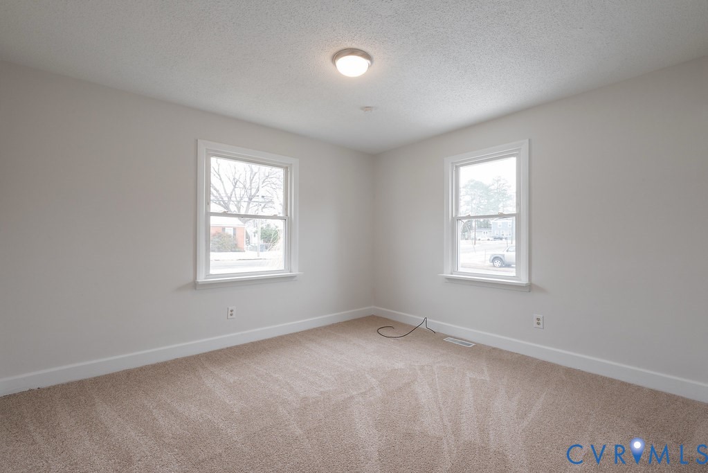 1715 West City Point Road Hopewell, VA 23860 - Photo 11 of 22 an empty room with a window