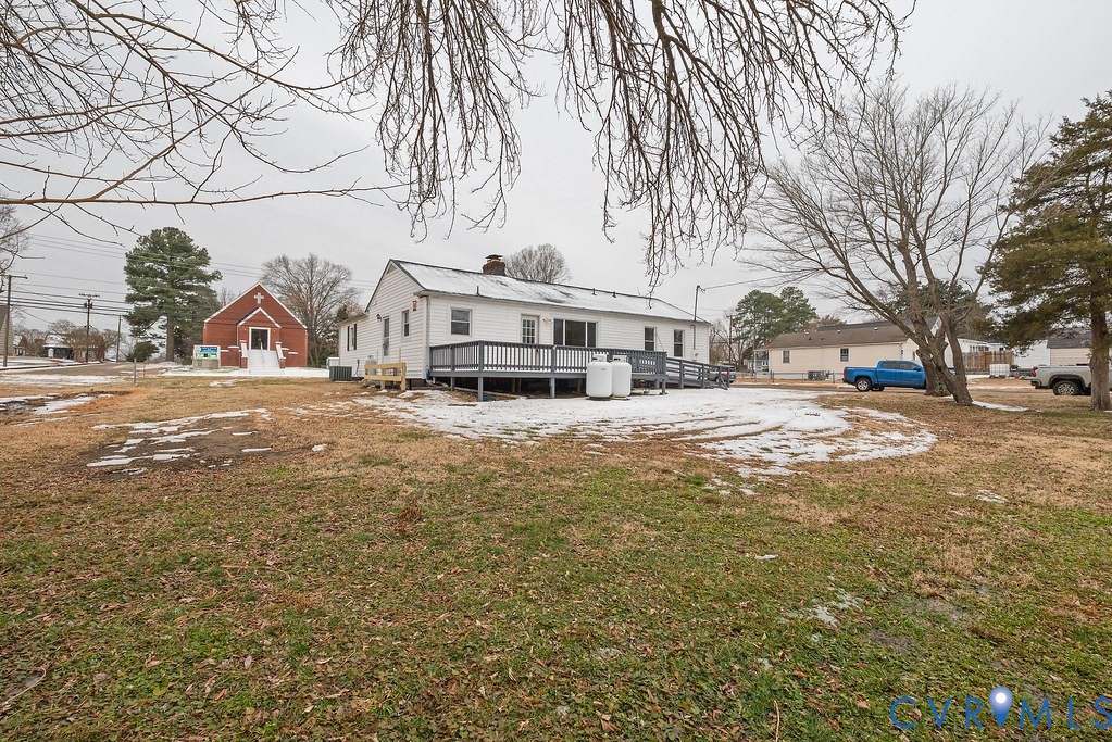 1715 West City Point Road Hopewell, VA 23860 - Photo 19 of 22 a view of residential houses with yard and trees
