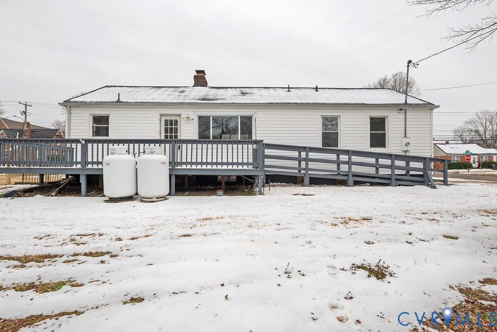1715 West City Point Road Hopewell, VA 23860 - Photo 21 of 22 a view of a house with a yard covered in snow