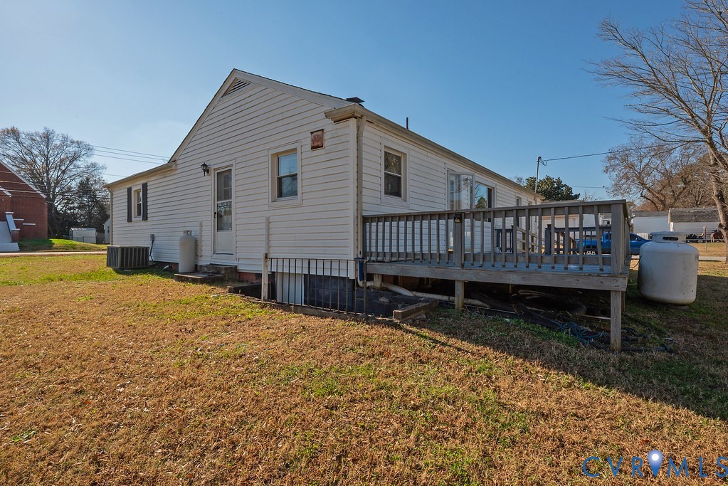 1715 West City Point Road Hopewell, VA 23860 - Photo 28 of 30 a view of a house with wooden fence and a yard