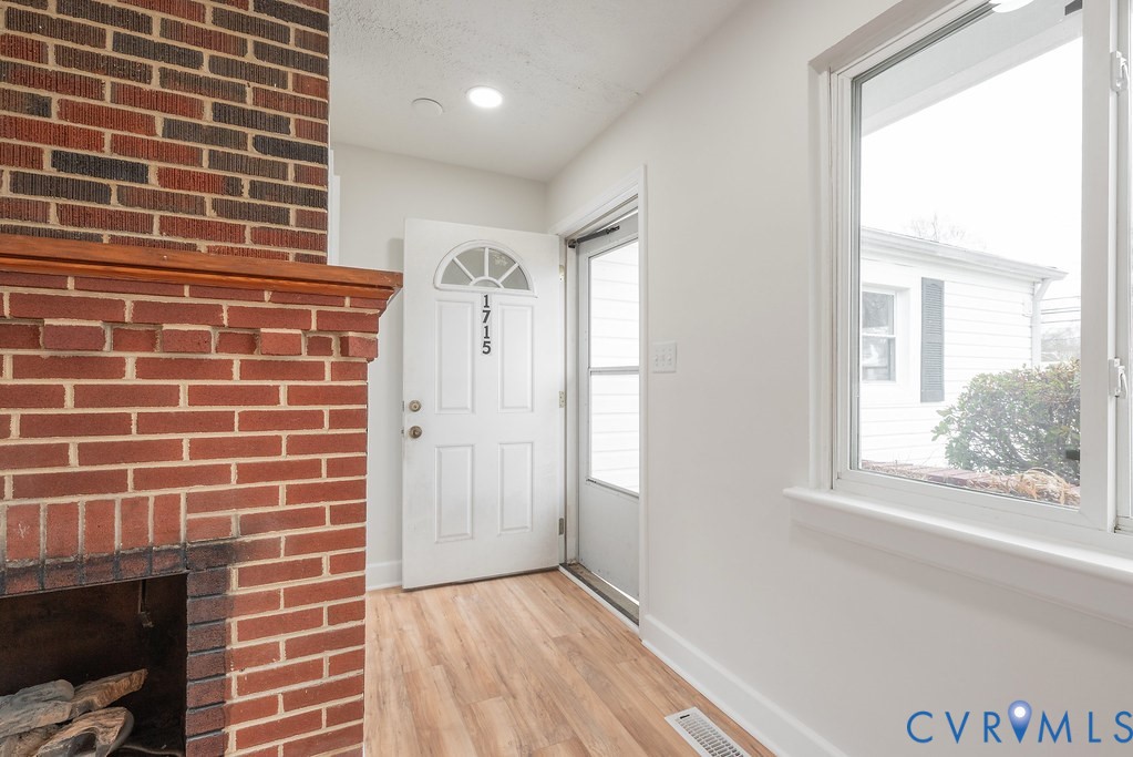 1715 West City Point Road Hopewell, VA 23860 - Photo 3 of 22 a view of an empty room and window