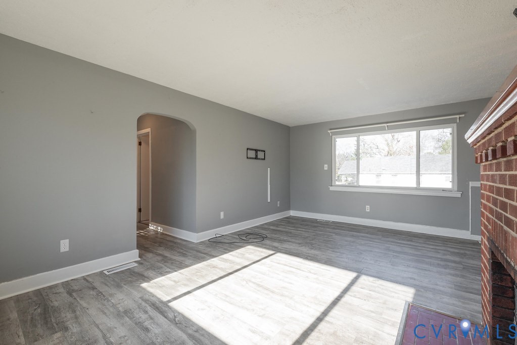 1715 West City Point Road Hopewell, VA 23860 - Photo 6 of 30 an empty room with windows