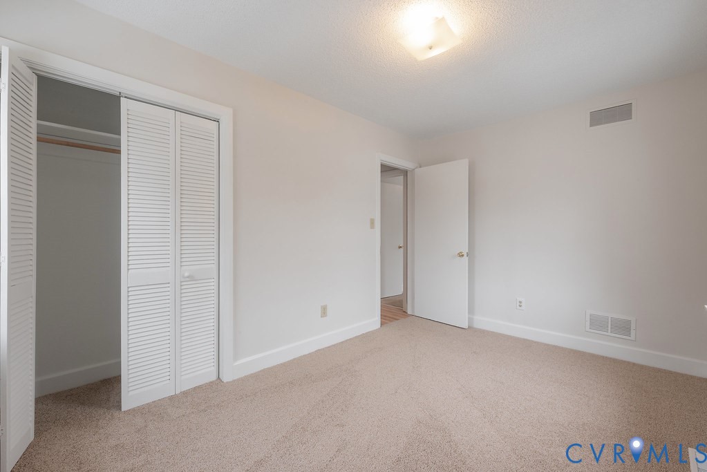 1715 West City Point Road Hopewell, VA 23860 - Photo 10 of 22 an empty room with closet area