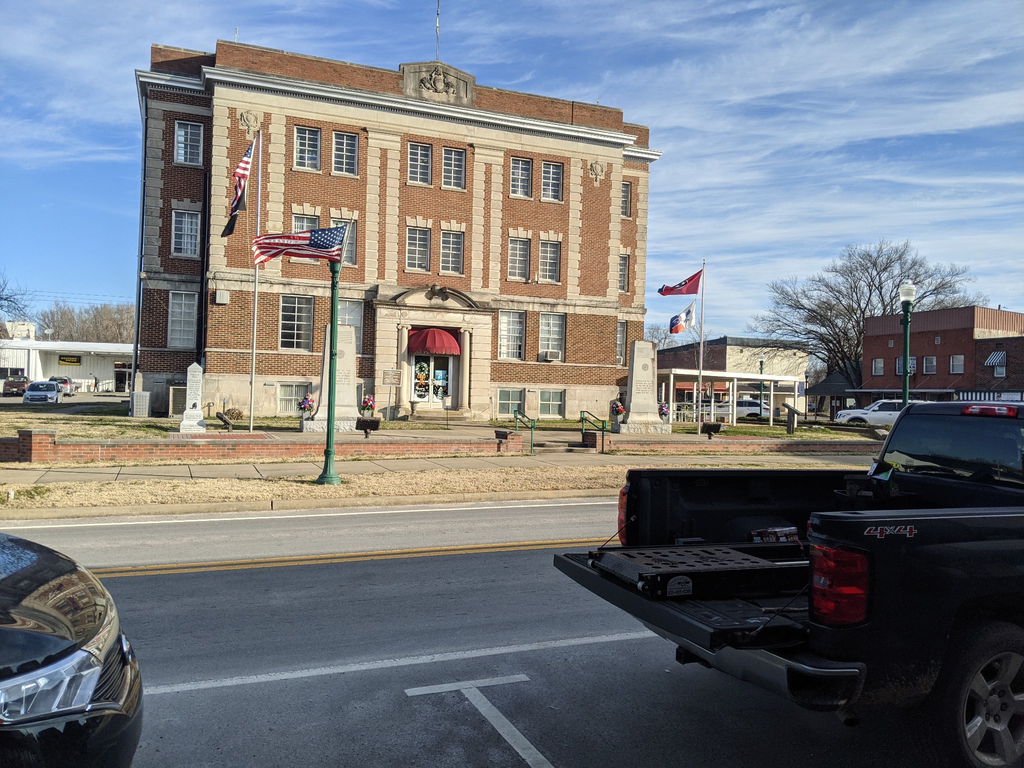 482 Center Ridge Drive Linden, TN 37096 - Photo 19 of 22 a view of a building and car parked on the road