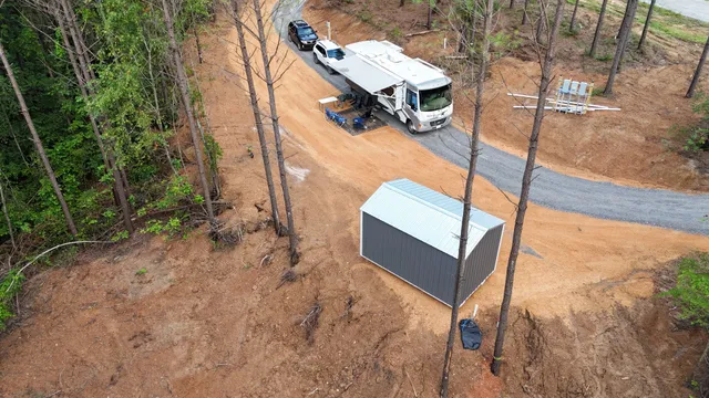 a view of a patio with a table and chairs