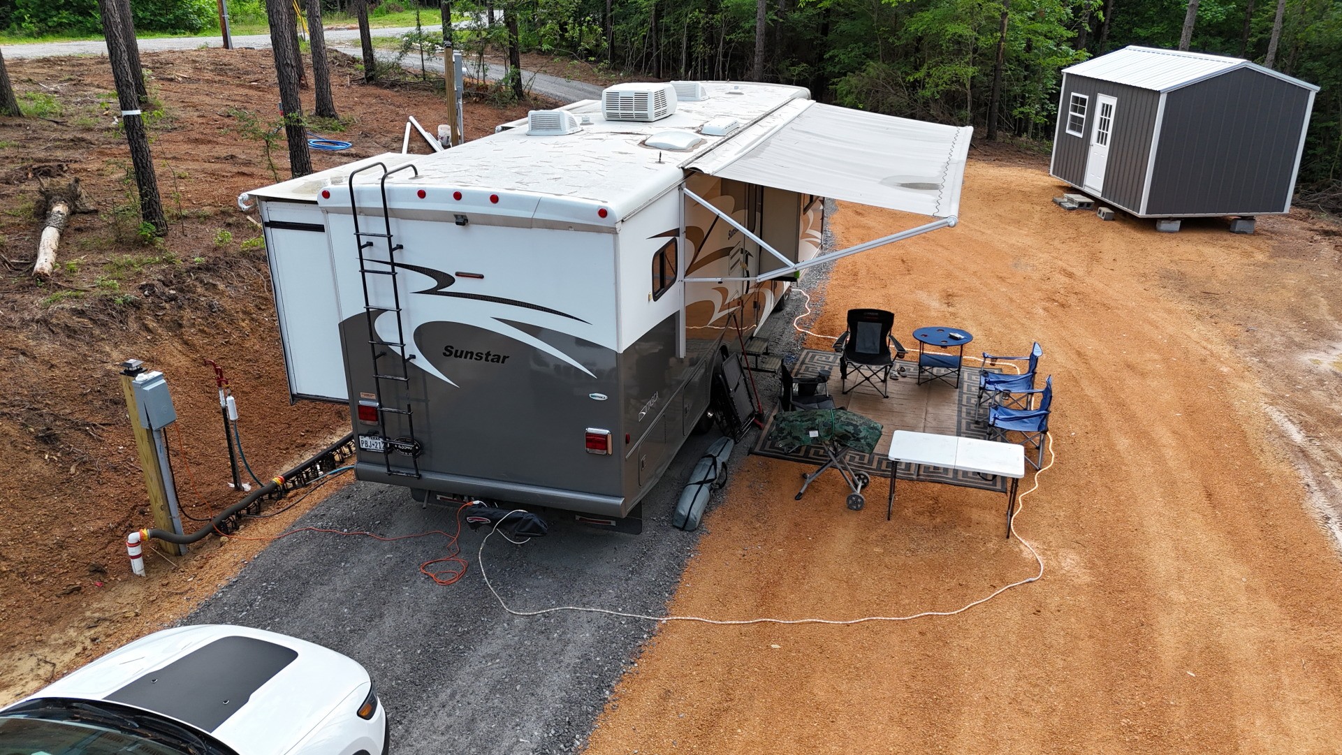 482 Center Ridge Drive Linden, TN 37096 - Photo 7 of 22 a view of a patio with table and chairs with wooden floor and fence