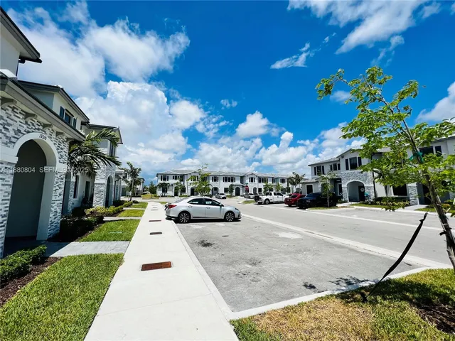 a view of a building with a street