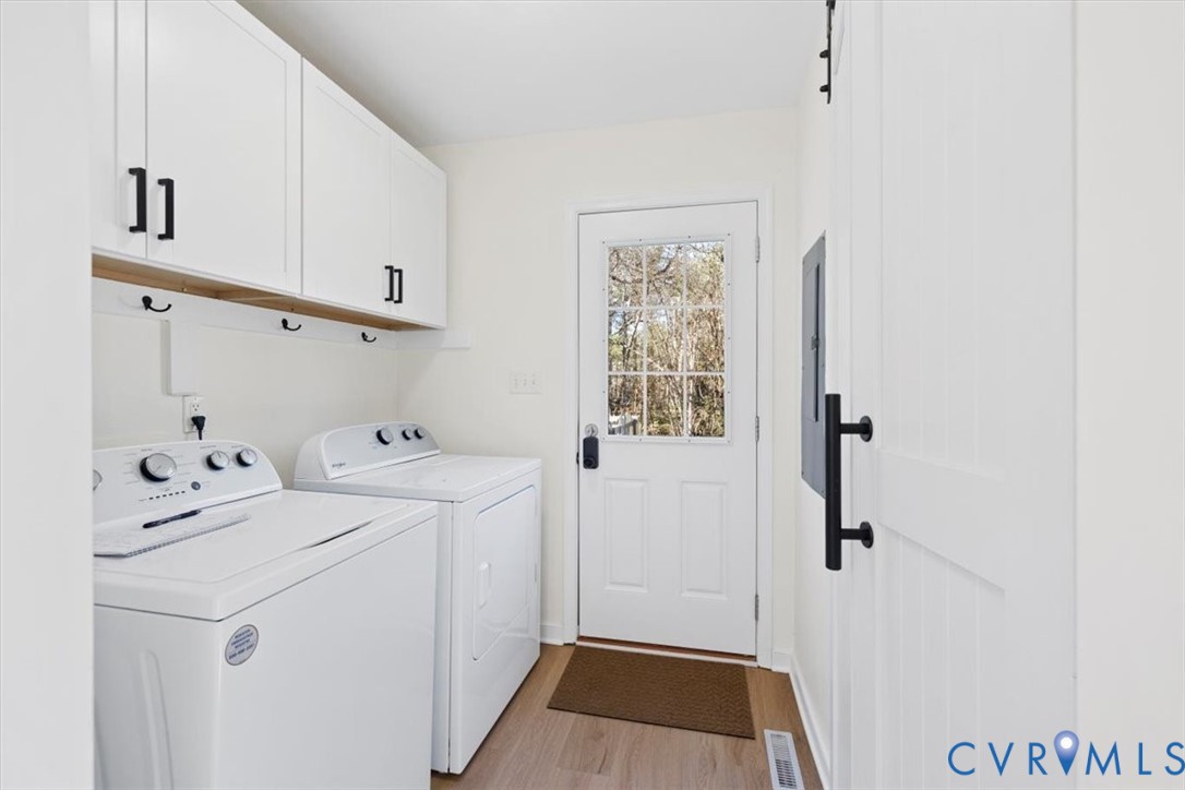 4255 Pierce Road Powhatan, VA 23139 - Photo 15 of 34 Laundry area with cabinet space, separate washer a