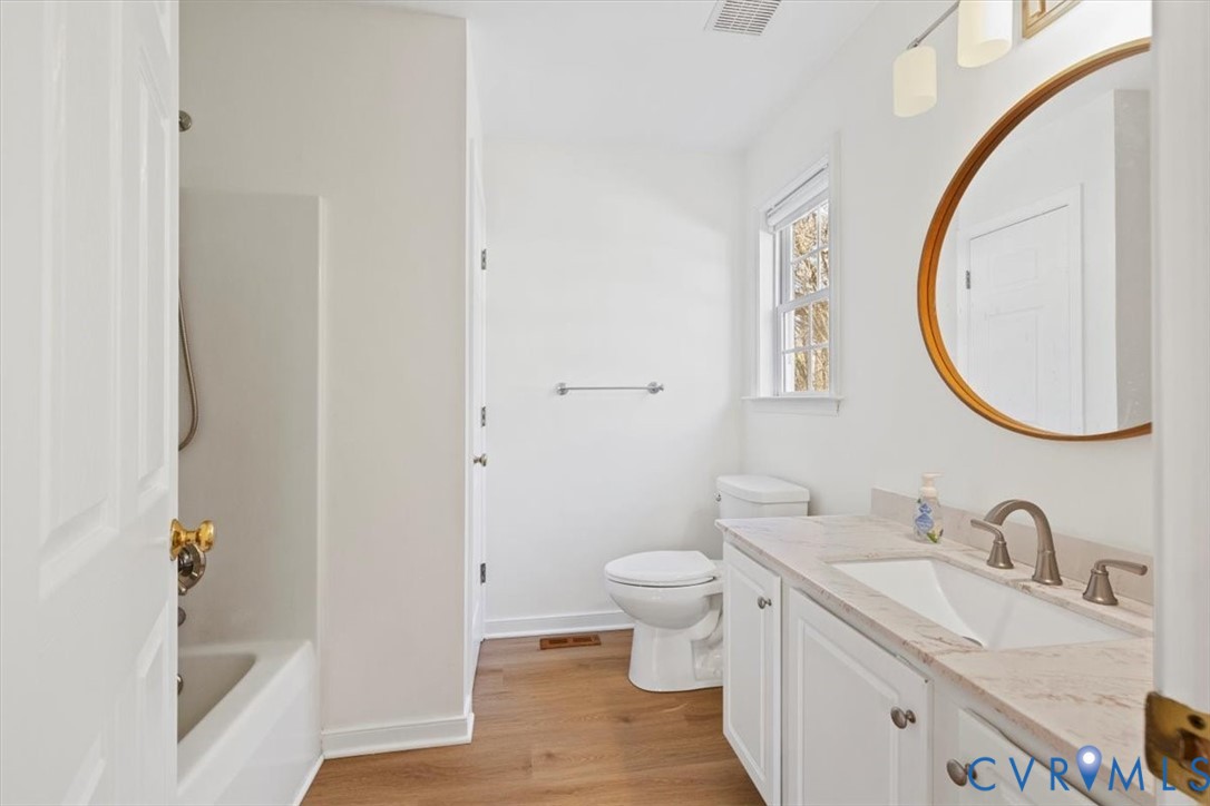 4255 Pierce Road Powhatan, VA 23139 - Photo 18 of 34 Full bathroom featuring vanity, light wood-type fl