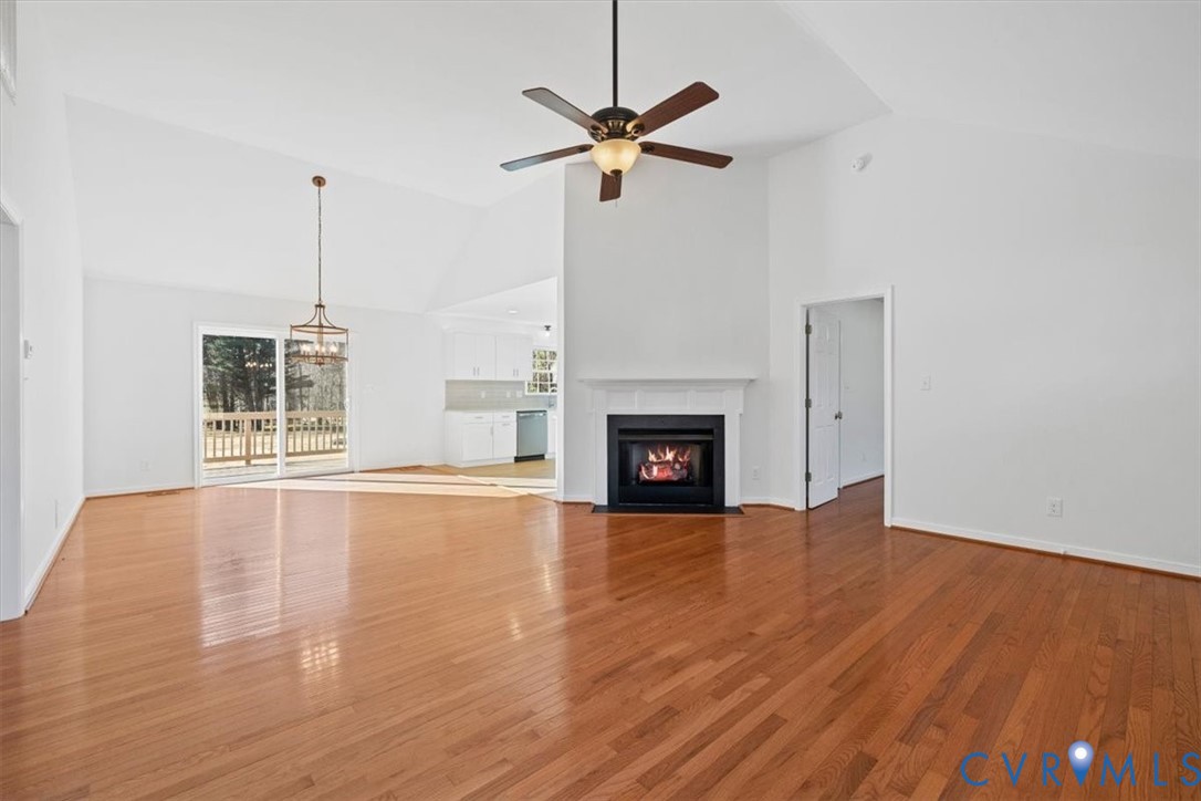 4255 Pierce Road Powhatan, VA 23139 - Photo 7 of 34 Unfurnished living room with a fireplace with flus
