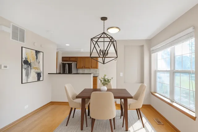 a kitchen that has a sink and a stove