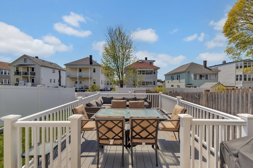 9-11 Locust Street, Unit 2 Winthrop, MA 02152 - Photo 25 of 41 a view of a chairs and table on the terrace