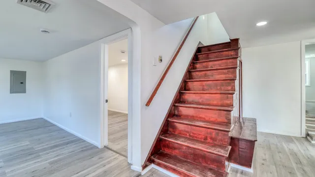 a view of entryway with wooden floor