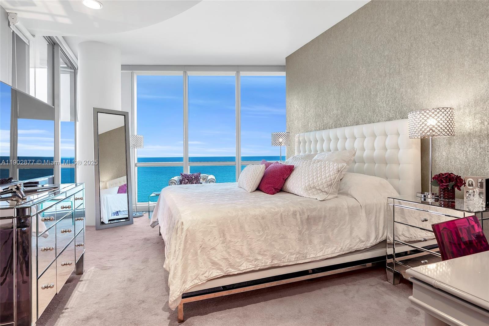 17121 Collins Avenue, Unit 2906 Sunny Isles Beach, FL 33160 - Photo 20 of 42 a bedroom with a bed and a dresser
