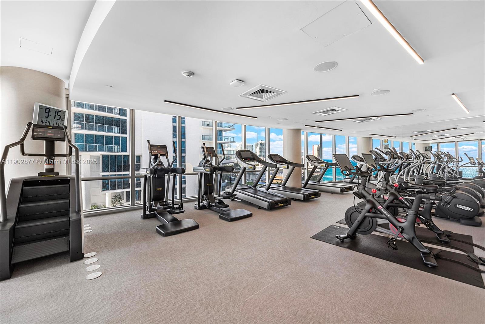 17121 Collins Avenue, Unit 2906 Sunny Isles Beach, FL 33160 - Photo 39 of 42 a view of a room with gym equipment