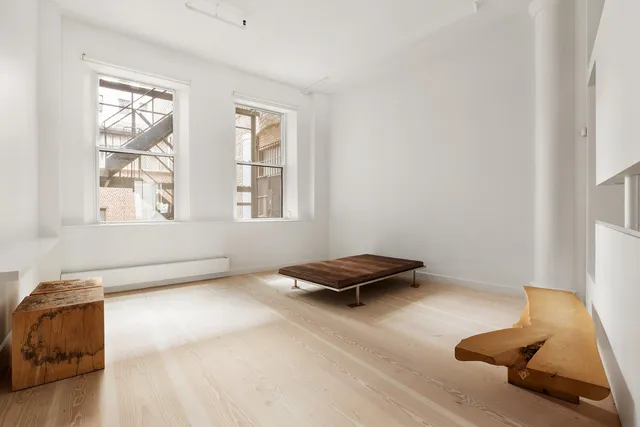 a bathroom with a bathtub and sink