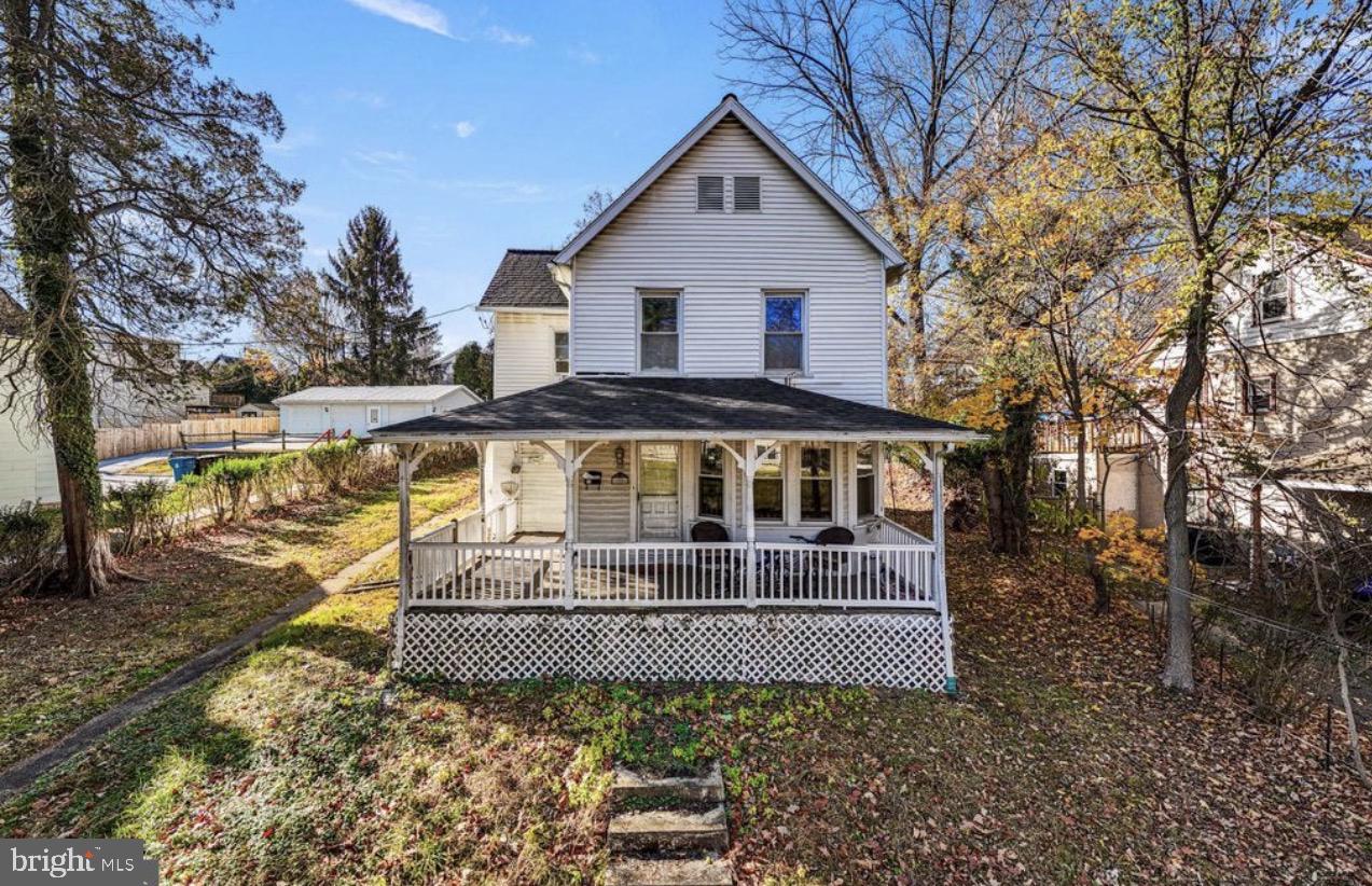 Charming home with inviting porch.